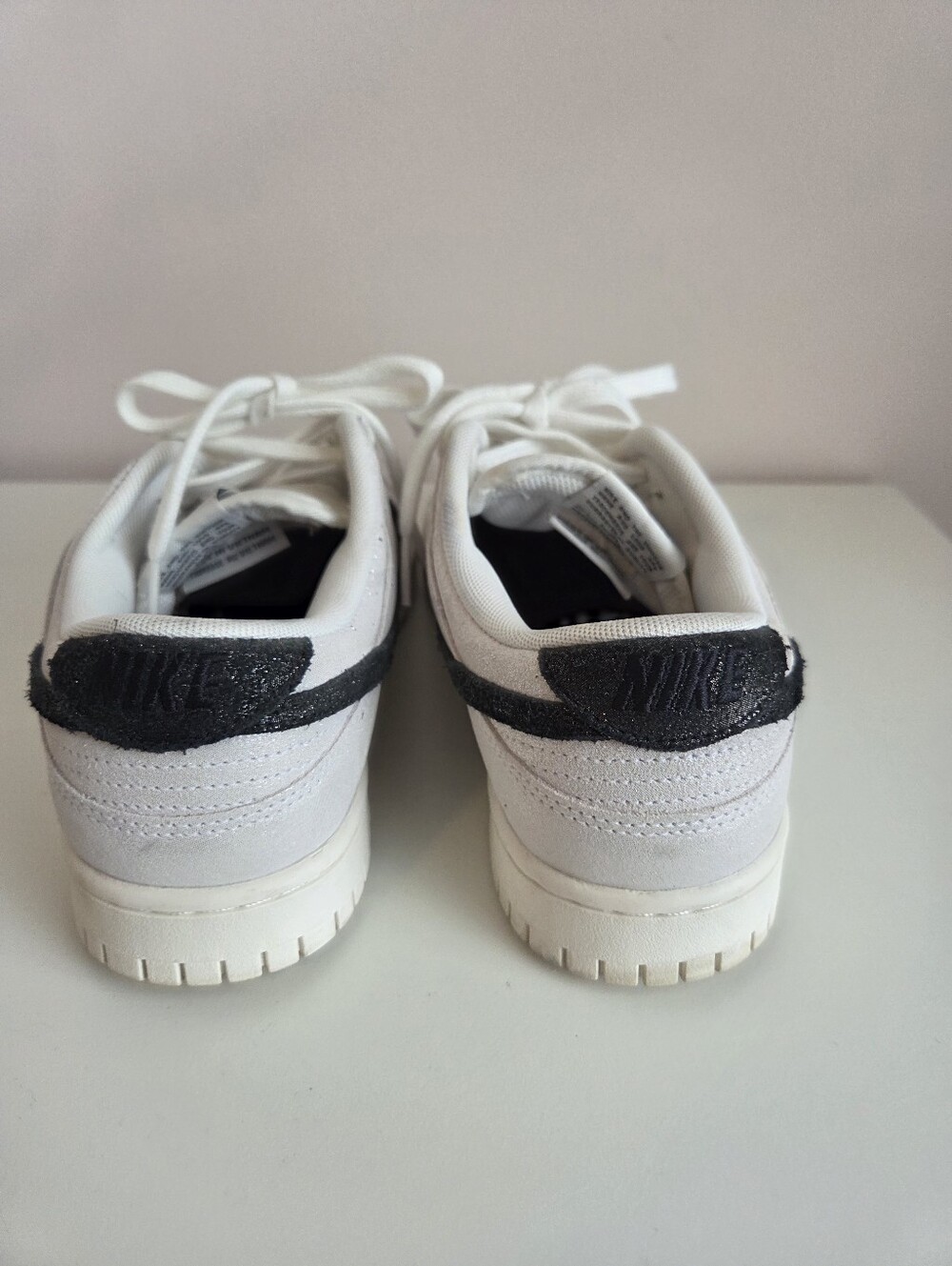 Nike Men’s White Sneakers with Black Heel Swoosh